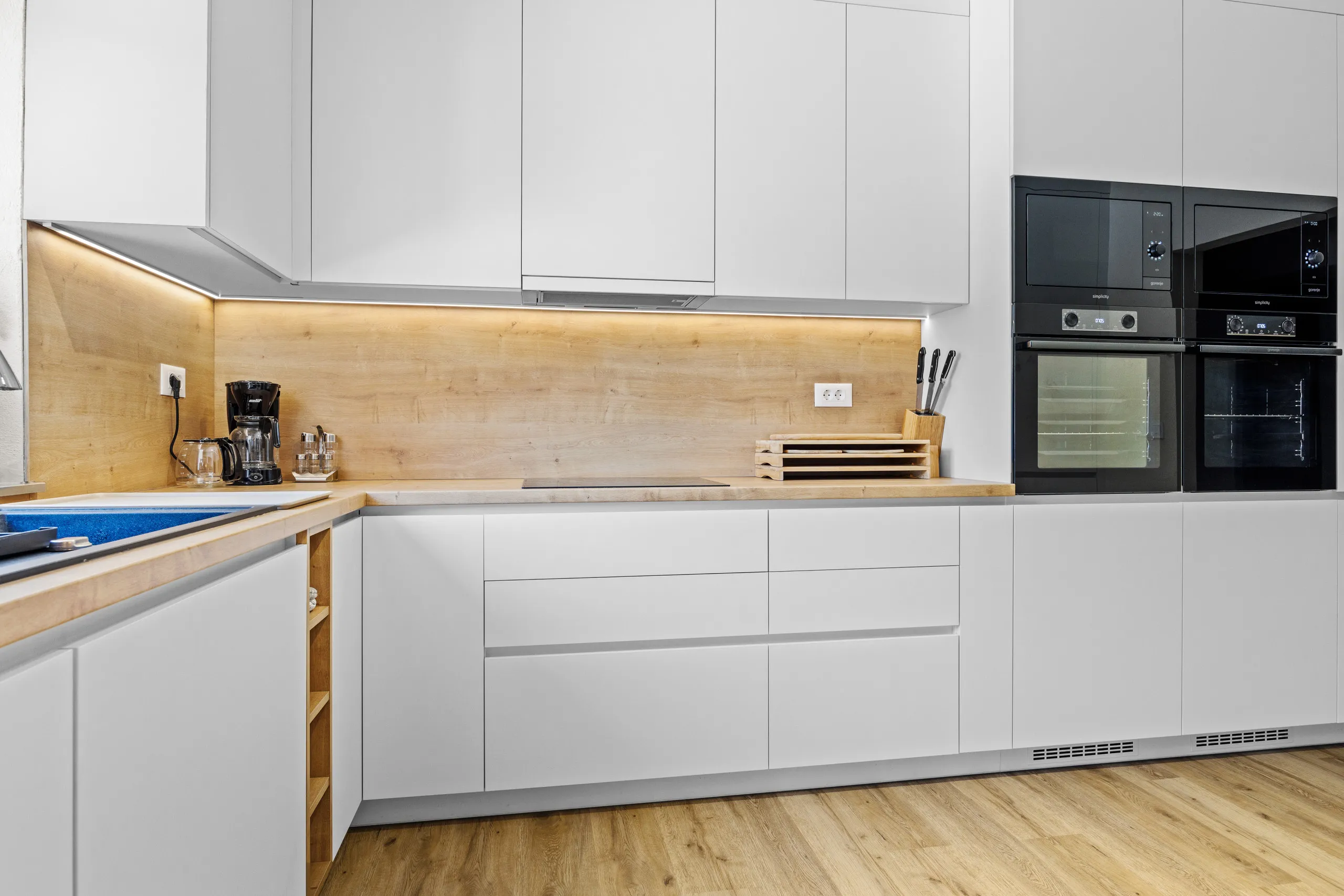 The second kitchen, fitted out in the same white units